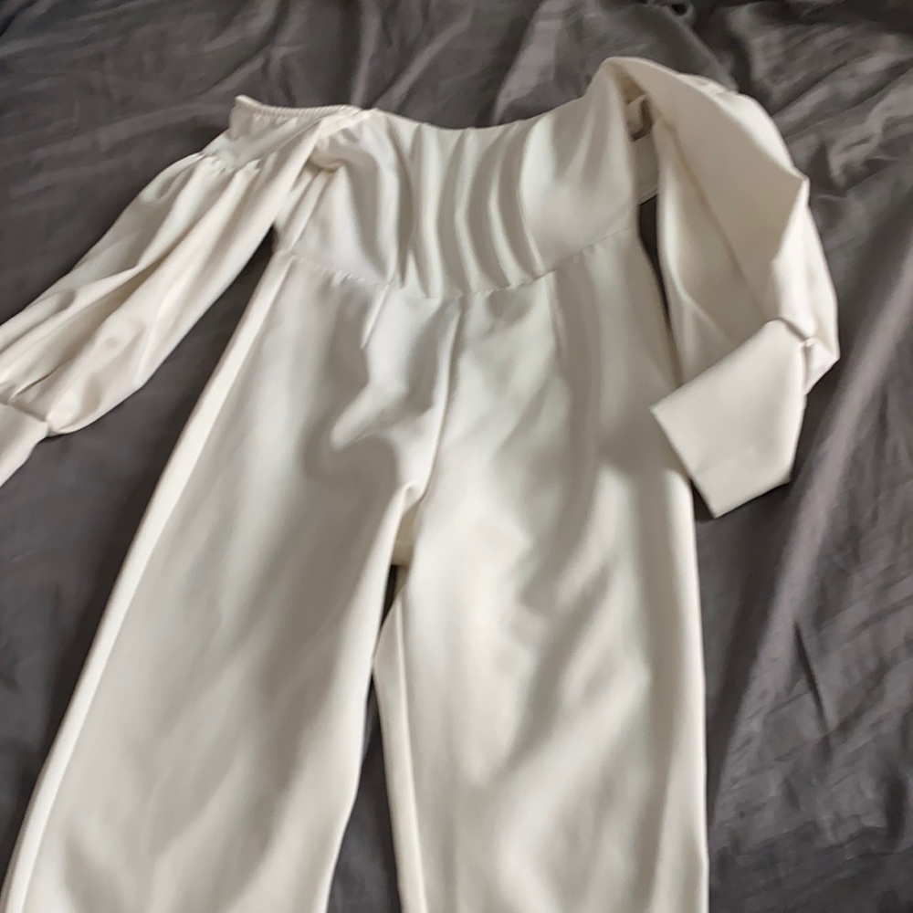 Pretty little thing jumpsuit in a off white color